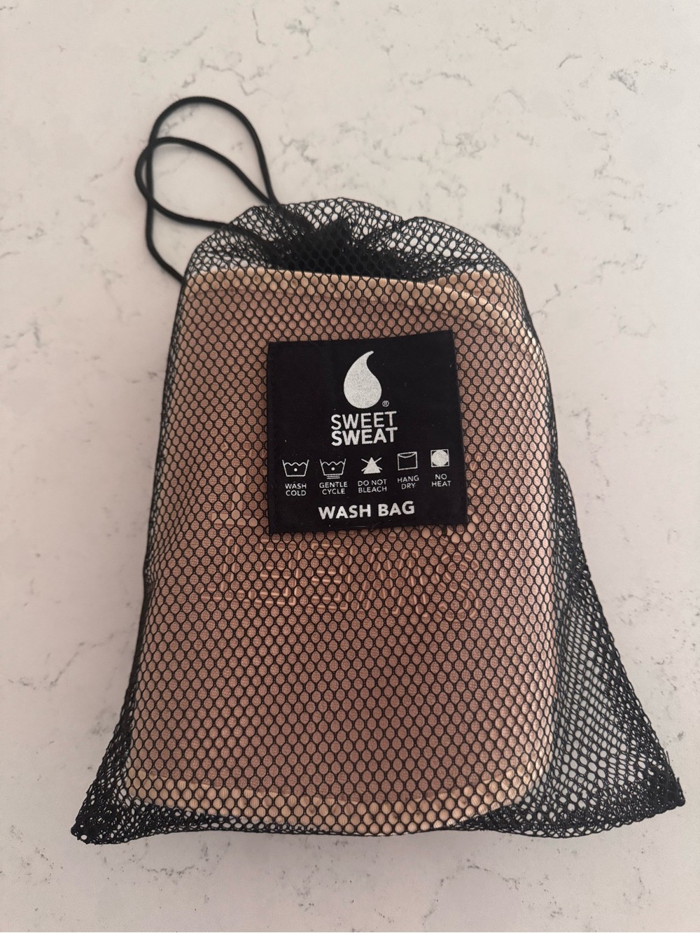 Sweet Sweat in Rose Gold with Black Mesh wash bag